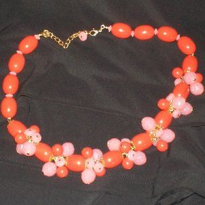 Fashion two-toned orange bead necklace.